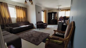 Apartment, 3 Bedrooms, Smoking, Balcony | Living room | Books - Charming 3-bedroom Apartment in Alexandria With City View (Alexandria)