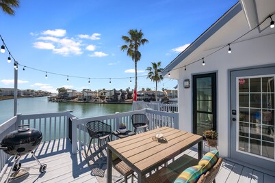 Fish off your private boat dock! Luxurious canal condo with stunning water view!