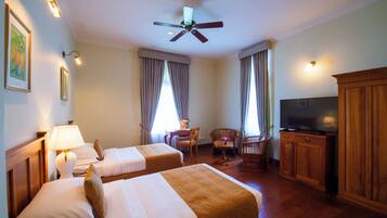 Bathtub, hair dryer, bathrobes, slippers