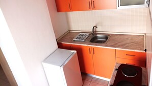 Apartamento, 1 quarto, para fumantes, sacada | Cozinha privada