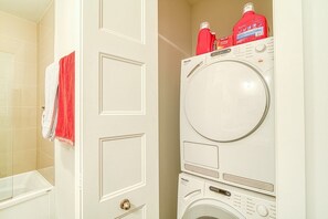 Hair dryer, towels, soap, toilet paper