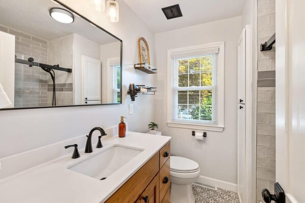 Bathtub, hair dryer, towels