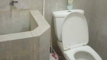 Economy Double Room | Bathroom | Shower, towels
