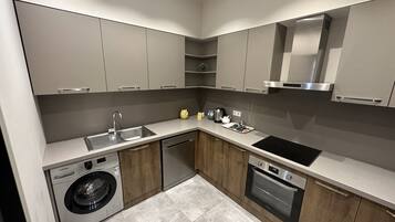 Microwave, cookware/dishes/utensils, ice maker, dining tables