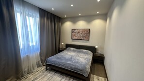 1 chambre, coffres-forts dans les chambres, fer et planche à repasser