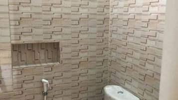 Deluxe-Zweibettzimmer | Badezimmer | Dusche, Regendusche, Seife