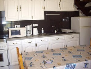 Refrigerador, microondas, horno, placa de cocina