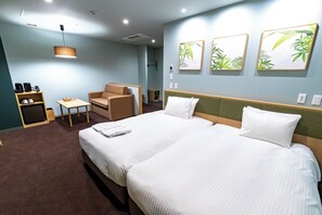 Chambre Deluxe avec lits jumeaux | Coffre-fort, bureau, rideaux d’obscurcissement