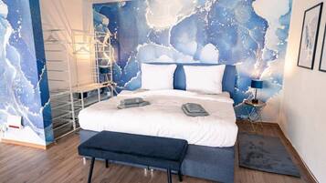 1 bedroom, desk, iron/ironing board, travel crib