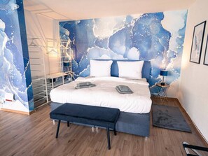 1 bedroom, desk, iron/ironing board, travel crib