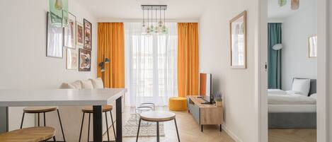 Comfort Apartment | Living area | Flat-screen TV