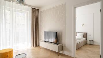 Apartamento conforto | Área de estar | TV de tela plana