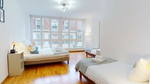 1 bedroom, desk, iron/ironing board, travel cot