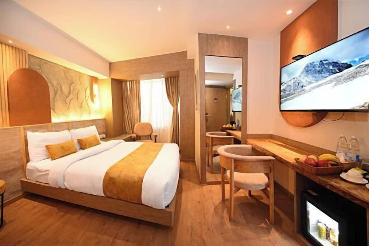 1 kamar tidur, seprai premium, busa memori, dan minibar