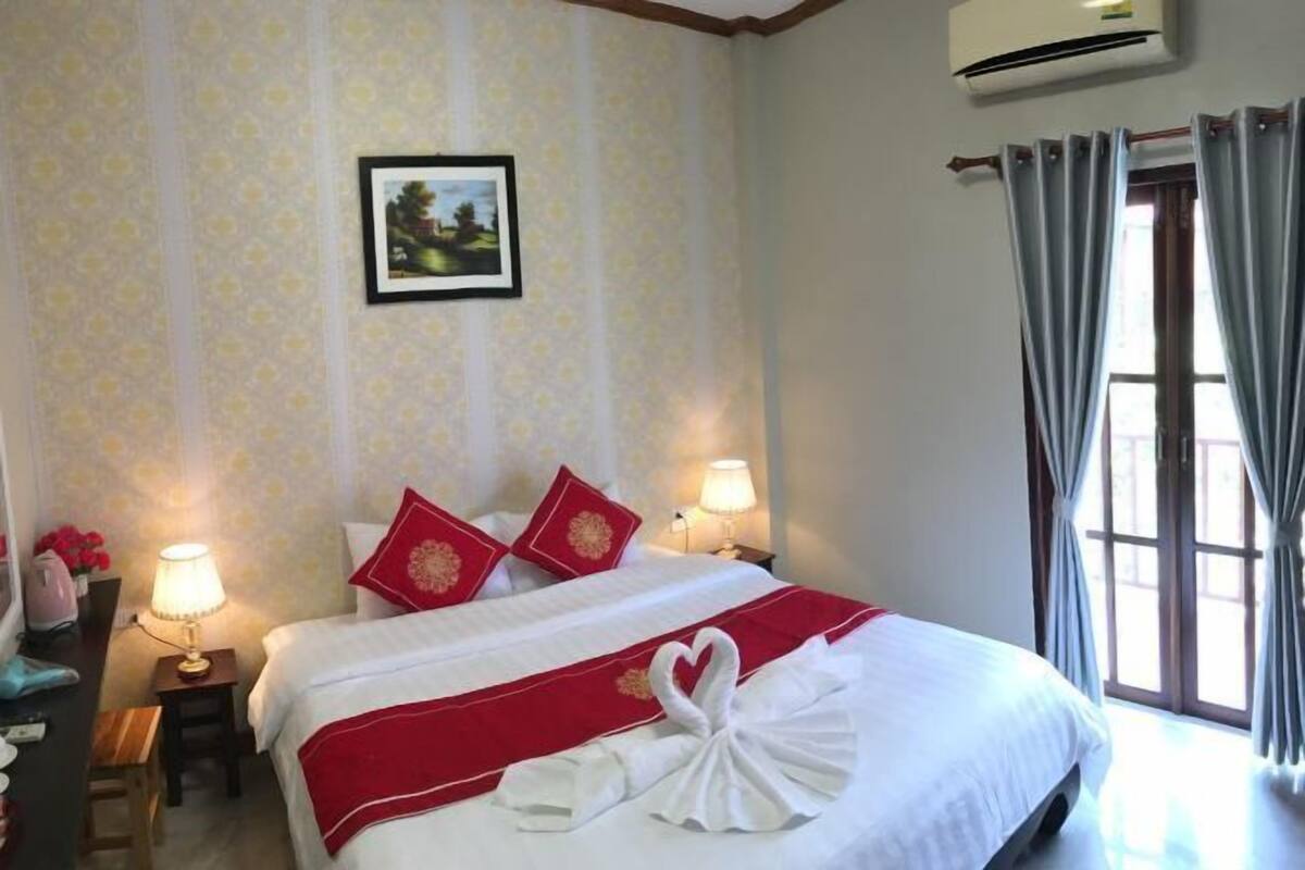 Premium bedding, down duvets, in-room safe, desk