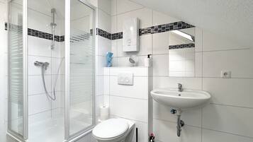 Hair dryer, towels, soap, toilet paper