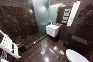 Shower, towels, soap, shampoo