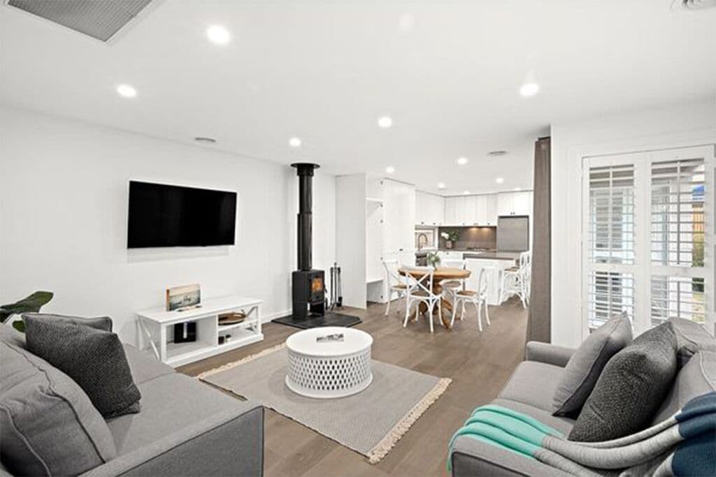 Smart TV, fireplace, DVD player, books