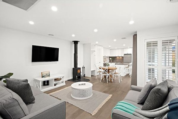 Smart TV, fireplace, DVD player, books