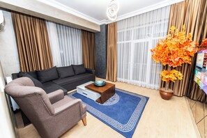 Family Suite | Living area | LCD TV, heated floors - Blue Vista Houses & Spa (Istanbul)