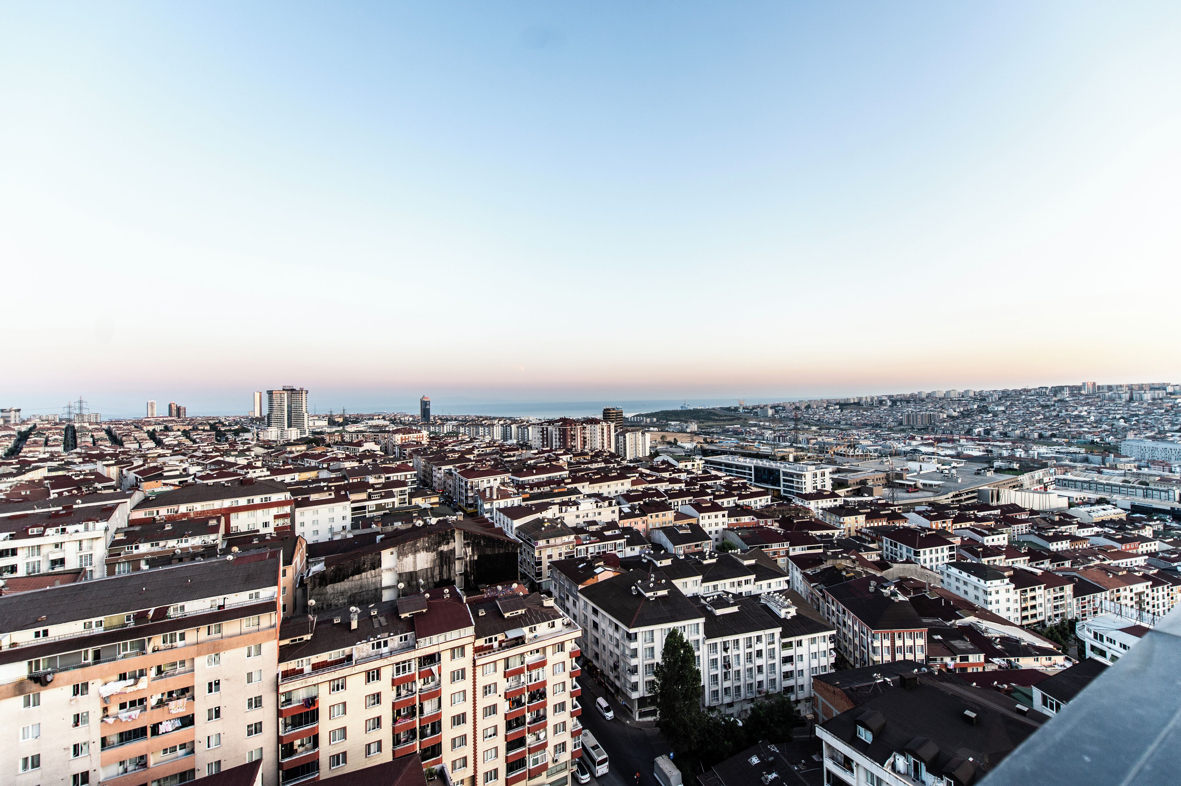 A cityscape with a variety of building types, including residential and commercial structures.