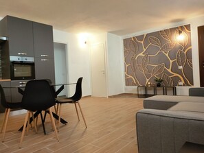 Basic Apartment | Living area - Suite Apartments i4MORI Porto Pino (Sant'Anna Arresi)