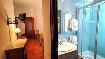 Desk, laptop workspace, blackout curtains, iron/ironing board