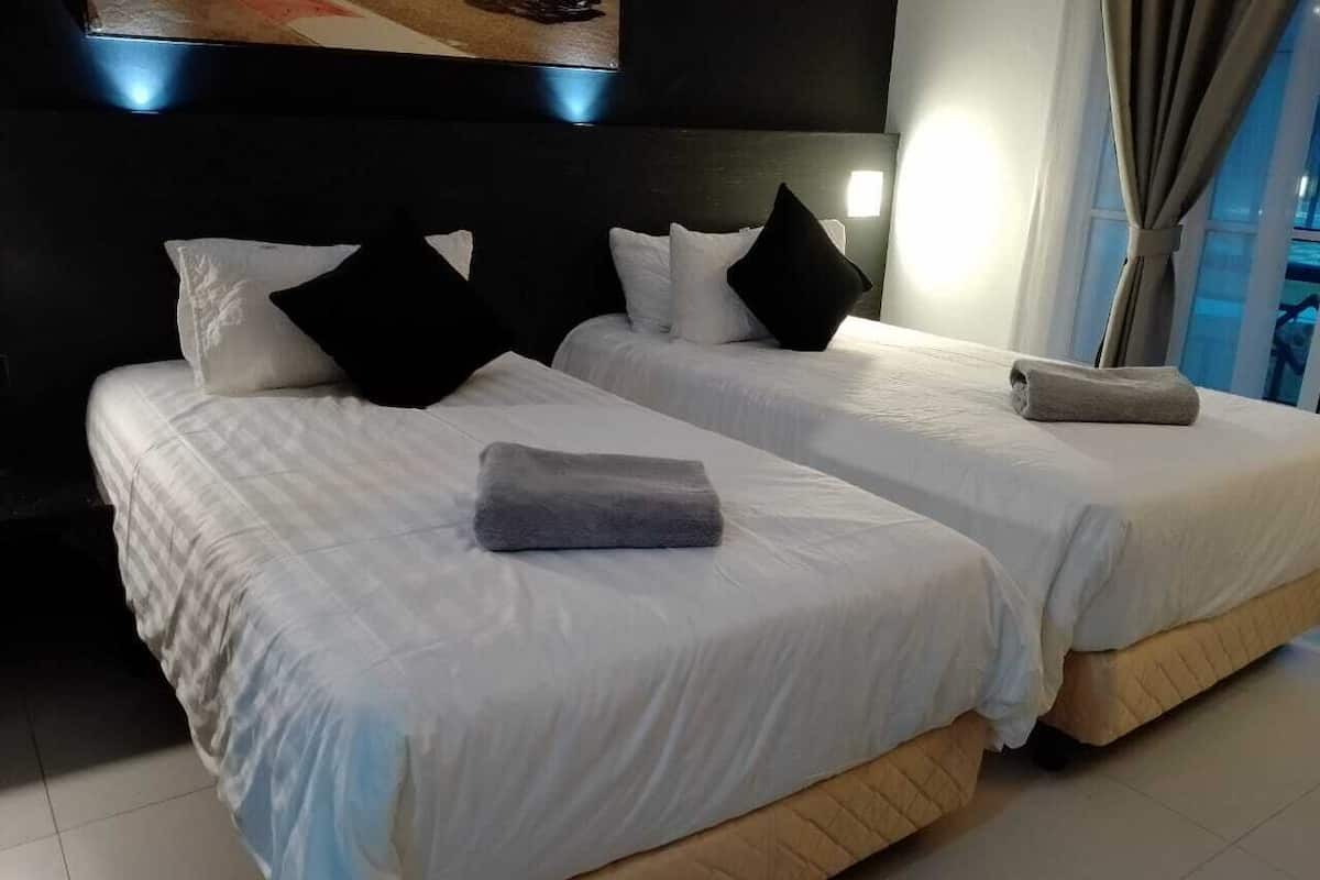 Deluxe Room, Multiple Beds, Pool View | In-room safe, iron/ironing board, WiFi (free)