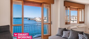 Una Finestra Su Cala Rossa by Wonderful Italy