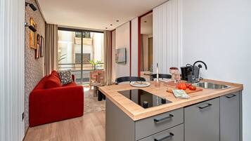 Deluxe Apartment | Living area | Smart TV