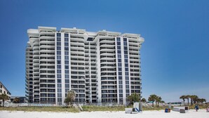 A high-rise hotel with multiple balconies and a beach view. - Watercrest #807 | Beach Views + Resort Pool! (Panama City Beach)