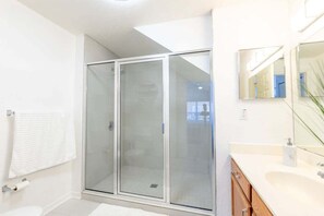 Bathtub, hair dryer, towels, soap