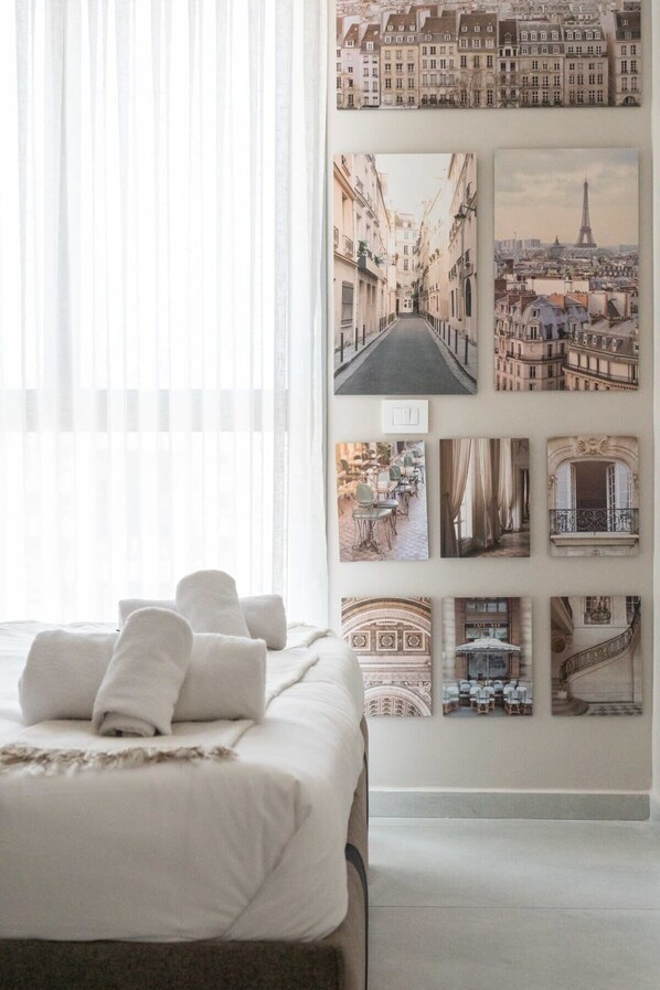 1 bedroom, desk, iron/ironing board, travel crib