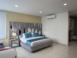 Junior Suite | 1 bedroom, premium bedding, minibar, in-room safe