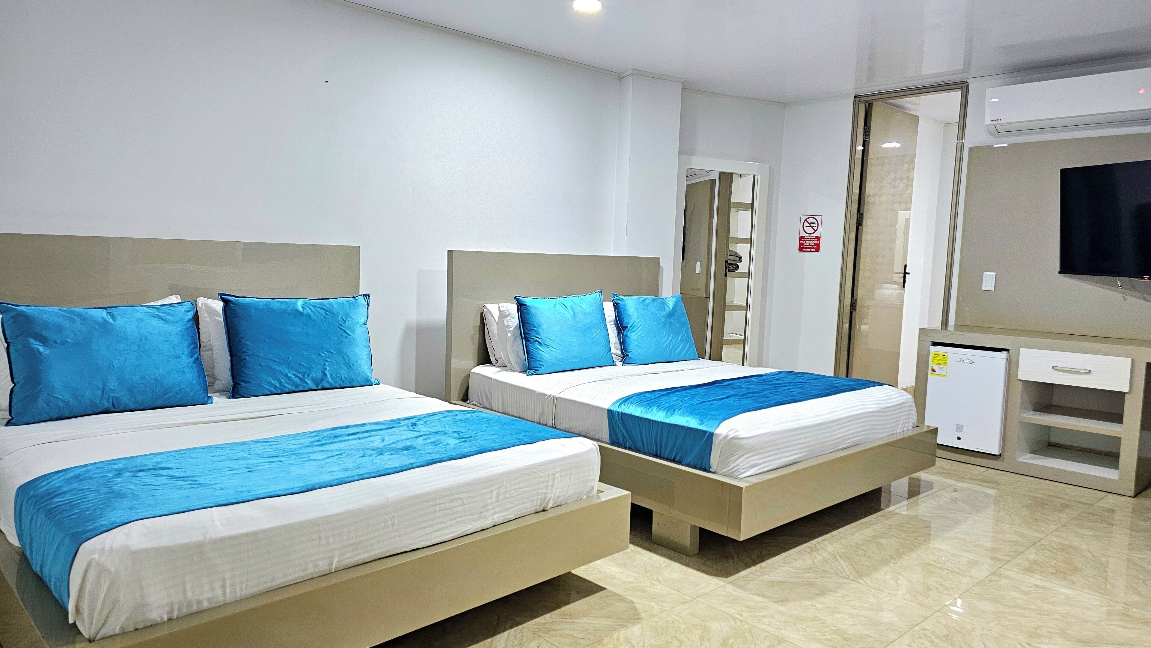 Suite Confort | 1 dormitorio, ropa de cama de alta calidad, minibar y caja fuerte