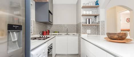 Grand Apartment | Private kitchen | Fridge, microwave, oven, stovetop