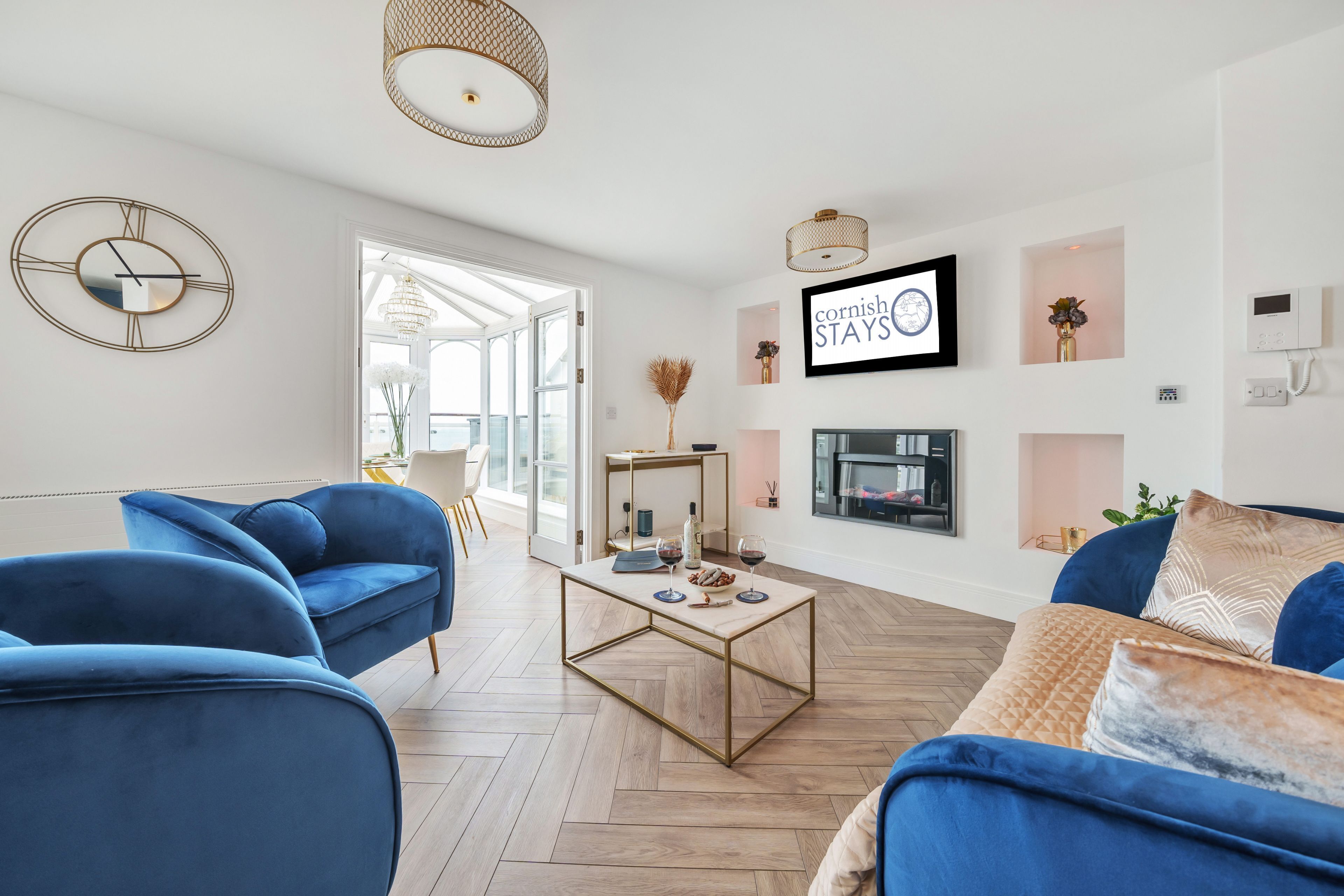 Smart TV, fireplace, books, music library