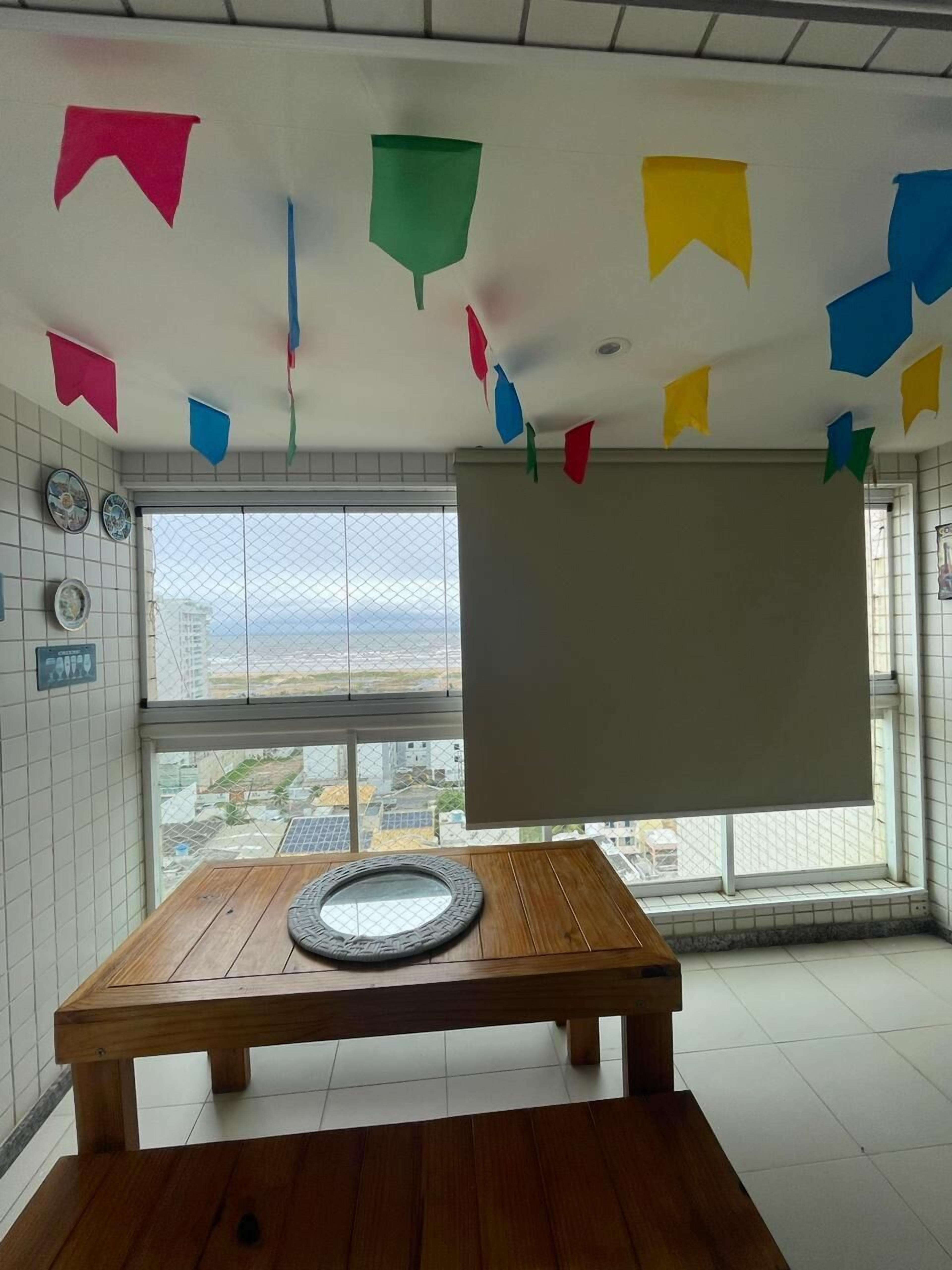 Apartamento família | Área de estar | Smart TV 50 polegadas com canais digitais