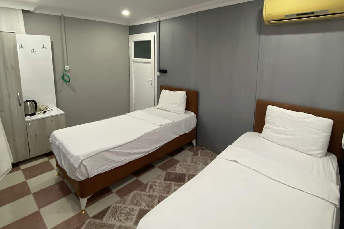 Twin Room, Multiple Beds | 2 bedrooms, soundproofing, free WiFi, bed sheets