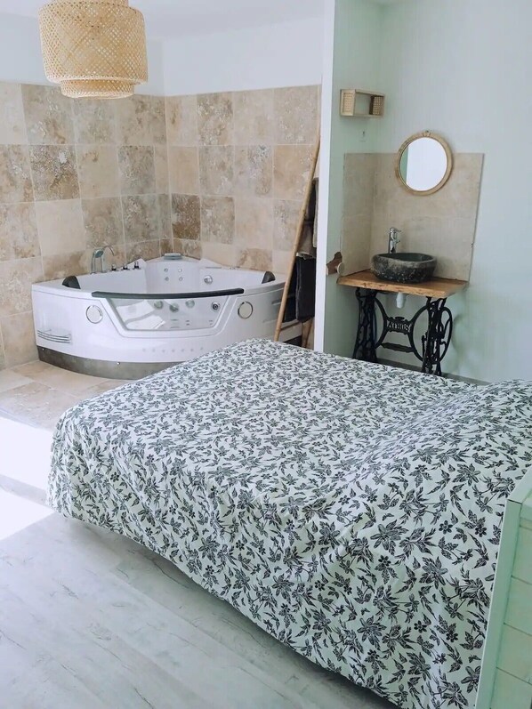 Jetted bath, hair dryer, towels, soap