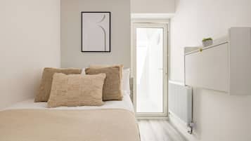 Hypo-allergenic bedding, individually furnished, iron/ironing board