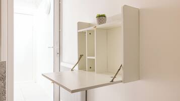 Hypo-allergenic bedding, individually furnished, iron/ironing board