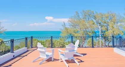 Tropical gem near beach with amazing Gulf view, pool, spa, game room & roof deck
