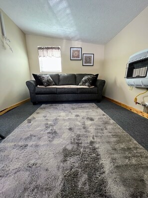 Living area - Delightfully secluded 1 bed and a loft for extra space. TV and DVD player.  (Stanton)