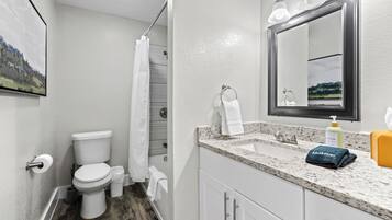 Hair dryer, towels, soap, shampoo