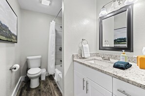 Hair dryer, towels, soap, shampoo