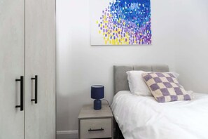 3 dormitorios, tabla de planchar con plancha, wifi y ropa de cama