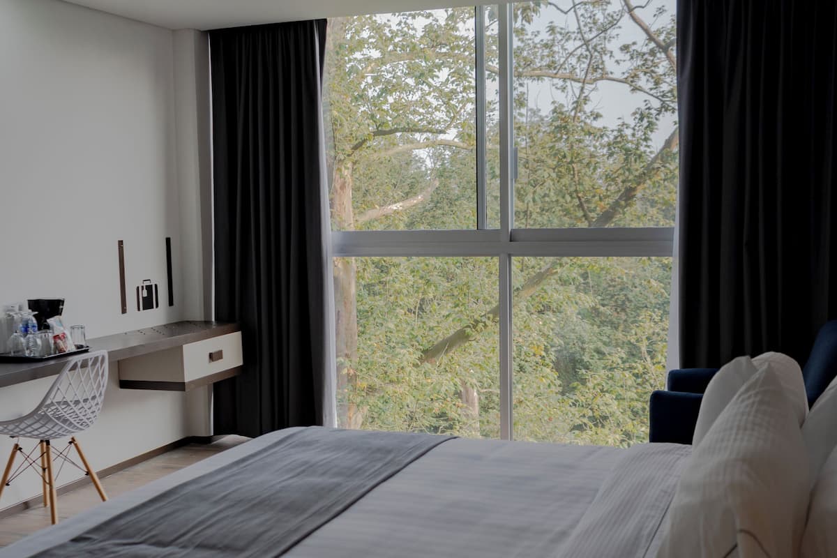 Premium bedding, down duvets, desk, iron/ironing board