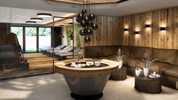 Una sala de estar moderna con una mesa de madera en el centro, un sofá y una zona de estar con un separador de vidrio.