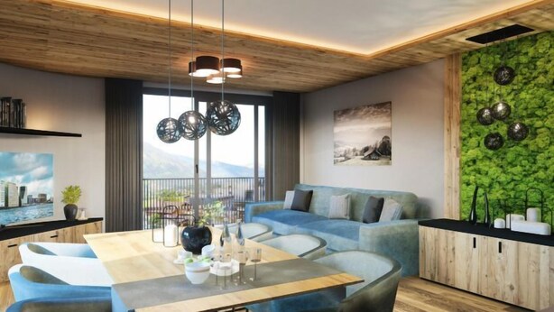 Ein modernes Wohnzimmer mit Holzboden, einer Wand mit Grüner Struktur und einem großen Fenster.